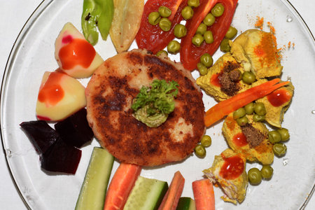 Asian Food Plate. Burger, Meat, Vegetables, Salad Servingの写真素材