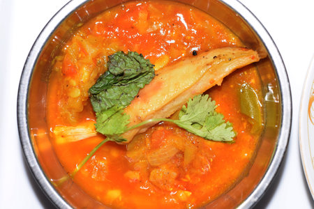 Asian Food Plate. Chicken Tikka, Vegetables, Curry, Side Course Servingの写真素材
