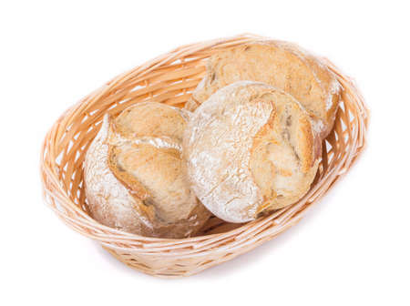 Basket with Bakery Products isolated on whiteの写真素材