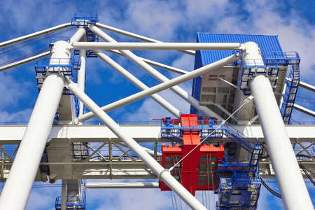 Goliath crane against clear blue sky backgroundの写真素材