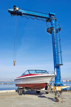 Port Crane for boats on a pierの写真素材