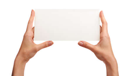 Business card in female handsの写真素材