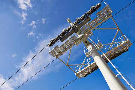 Cableway against summer blue skyの写真素材