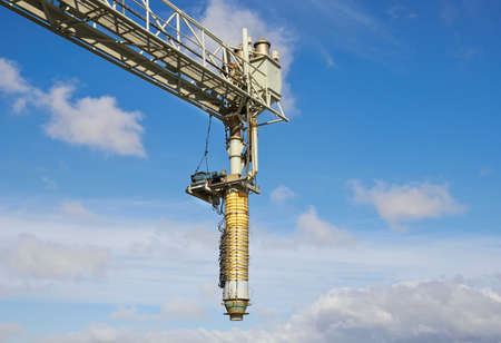 port crane against blue skyの写真素材