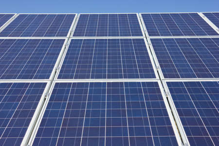 Solar panel close up against a blue skyの写真素材