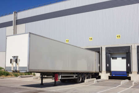 Single trailer of truck at loading docks の写真素材
