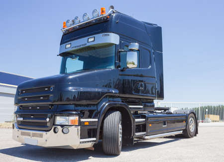 Black truck from ground level の写真素材