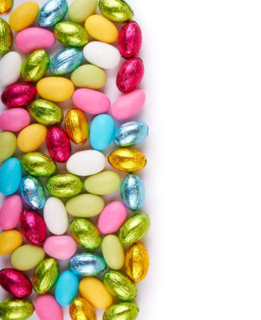 Colorful Chocolate Candy Easter Eggs Backgroundの写真素材