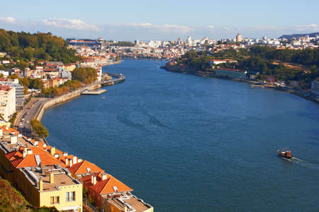 Porto houses rising up from the river Douro.の写真素材