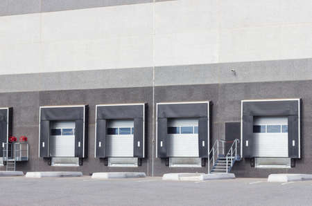 Loading dock cargo doors at big warehouse の写真素材