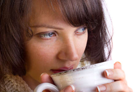 Young woman drinking teaの写真素材