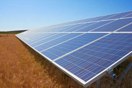 Solar Panel in a field of wheat の写真素材
