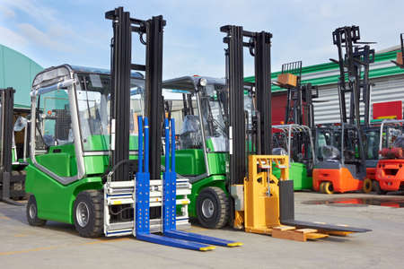 Electric forklift stackers in a rowの写真素材