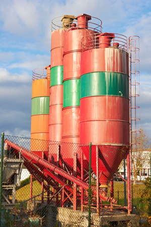Red iron containers against skyの写真素材