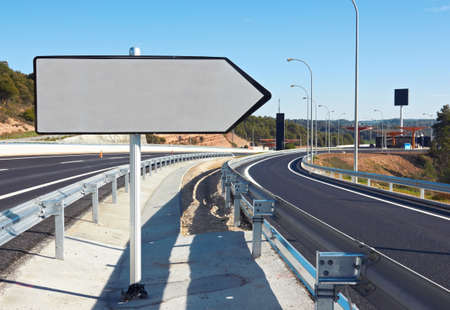 road sign along a highwayの写真素材