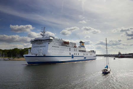 big liner sailing from port, Travemunde, Germany のeditorial素材