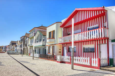 Houses with colorful stripes in Costa Nova, Aveiro, Portugalのeditorial素材