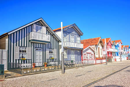 Typical houses with colorful stripes in Costa Nova, Aveiro, Portugalのeditorial素材