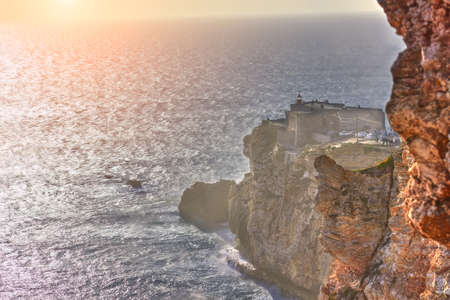 Nazare's lighthouse in North Canyon, Nazare, Portugalの写真素材