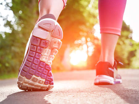 Runner Woman Feet, Close Up. Summer sunsetの写真素材