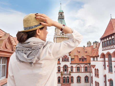 Woman traveler in hat enjoying Hannover City viewの写真素材