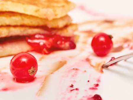 Plate with pancakes and berry jamの写真素材