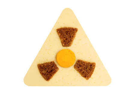 Radioactive radiation danger symbol with yellow and black stripes made from food, concept of unsafe foodの写真素材