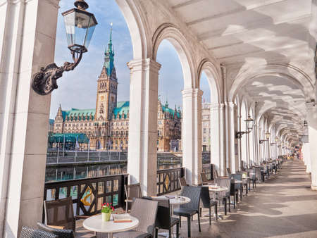 Alsterarkaden on Lake Kleine Alster in Hamburg, view of historic Hamburg town hallの写真素材