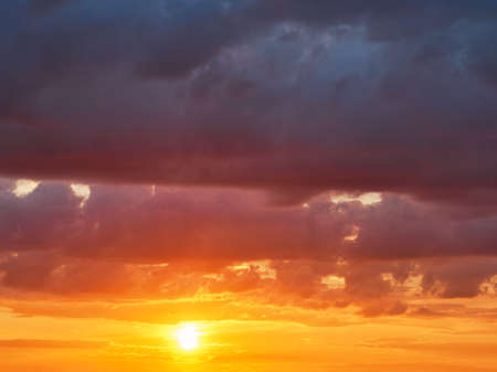 Bright orange and yellow colors sunset skyの写真素材