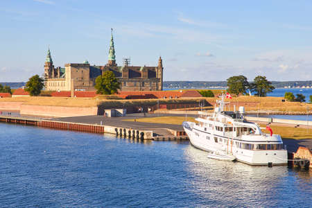 Ferry boat at pier, Kronborg castle at backgroung, Helsingor, Zealand, Danmark Europeの写真素材