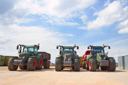 Agricultural machinery. Three heavy industrial tractors viewの写真素材