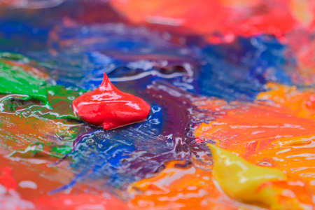 Mixed oil or paint on pallete. Close upの写真素材