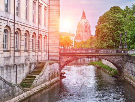 River Leine in Hanover city. City Hall background. View at sunset. Germanyの写真素材