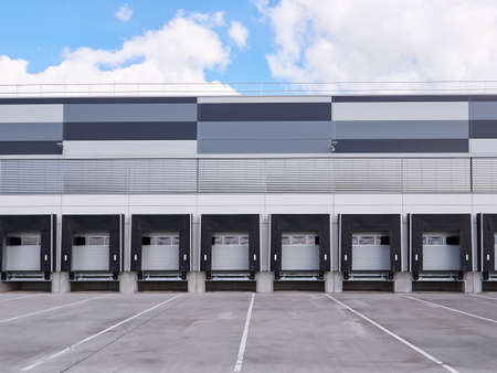 Row of Loading and unloading ramps of large distribution and logistic warehouseの写真素材