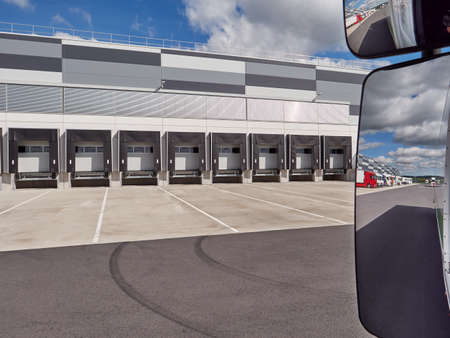 Row of Loading ramps of large warehouseの写真素材