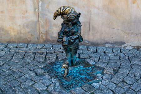 Dwarf on the street corner - Wroclaw, Poland