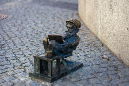 Dwarf on the street corner - Wroclaw, Poland