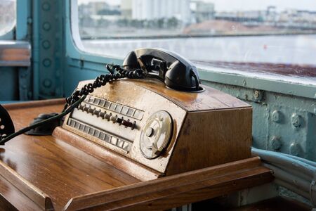 Retro telephone in the wheelhouse