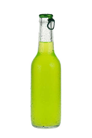 Cold, green beverage in closed, clear glass bottle の写真素材