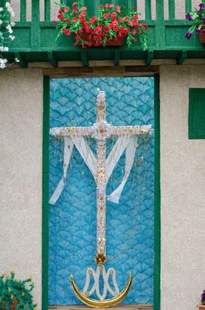 In the Canary Islands (Spain), on 3 May,  they celebrate the day of the cross. That day, the neighbors decorate the crosses with fabrics, flowers and jewels to be the prettiest cross of the island.の写真素材