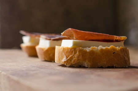 Skewer of goat cheese and dried beef meat of Leon, Spain.の写真素材