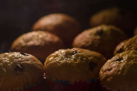 Making chocolate chip muffins. Seen through the glass of the oven.