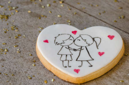 Butter cookie with heart shape for weddings or valentines day.の写真素材