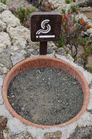 Ceramic ashtray outside. Smoking area signal.の写真素材