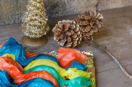 Mantecados and Polvorones,  wrapped with colored paper, on rustic background, typical Spanish Christmas sweets.の写真素材