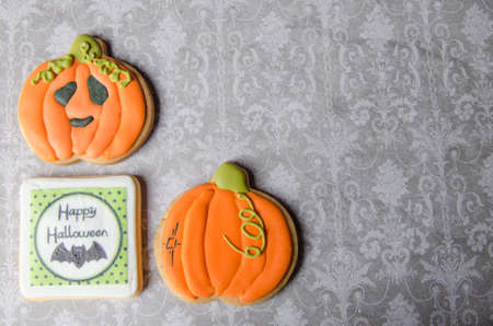 Homemade delicious gingerbread biscuits for Halloween, with different forms: pumpkin, ghost...の写真素材