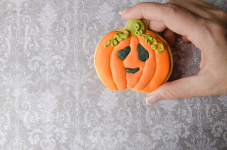 Homemade delicious gingerbread biscuits for Halloween, with different forms: pumpkin, ghost...の写真素材