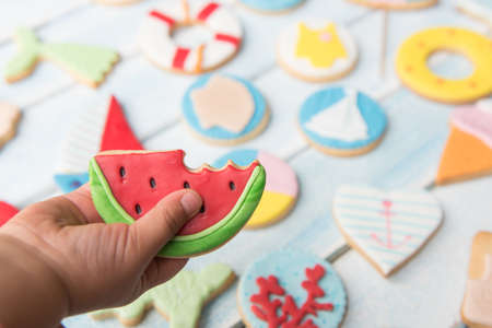 Group of butter cookies decorated with fondant. Summer concept.の写真素材