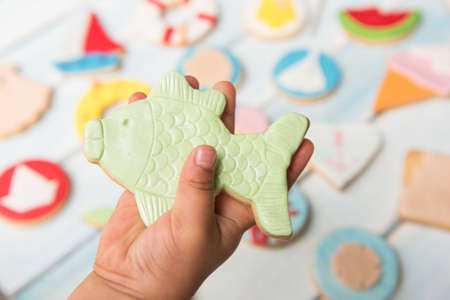 Group of butter cookies decorated with fondant. Summer concept.