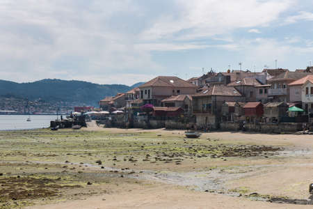village of Combarro in Ponteveda, Spain, famous for its stone cruceiros (calvaries) and horreos (raised granaries).の写真素材